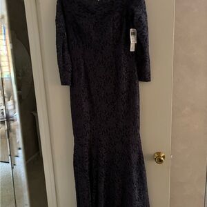 NEW WITH TAGS. Charcoal lace off the shoulder gown with shimmer